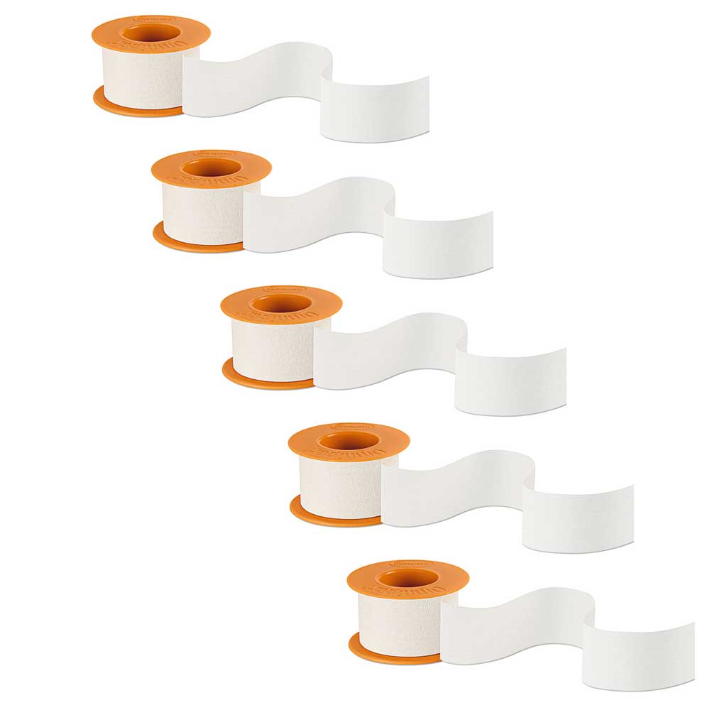 Mehrere Fixierpflaster-Rollen aus Vlies mit weißem Klebestreifen und orangefarbenem Kern