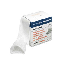 Holthaus Medical YPSELAST® Schlauchverband, weißes Schlauchverbandstück neben Karton