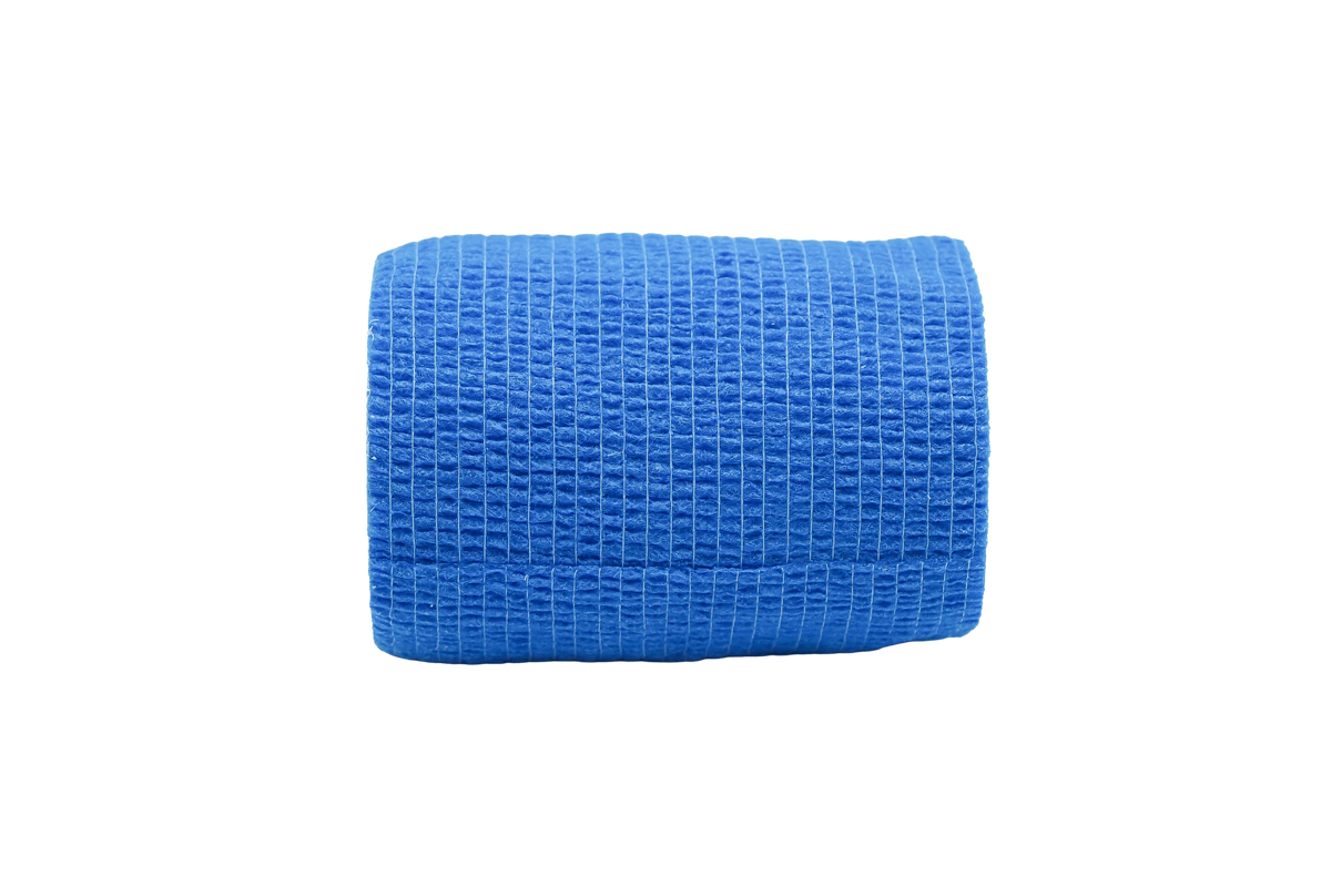 Blaue Vliesbandage-Rolle mit Gitterstruktur, kompakt gerollt