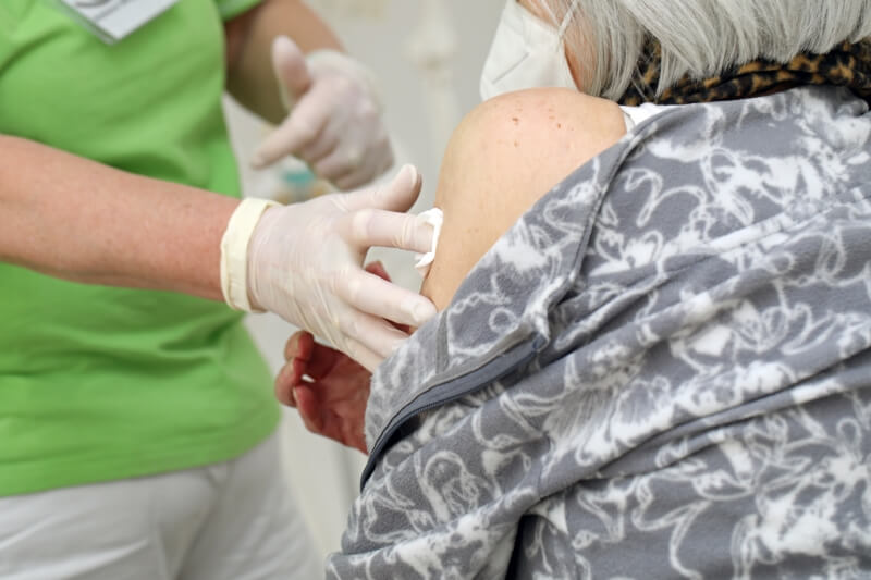 Doctor dabs patient's wound - buy dressing material now!